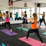 A group workout scene showcasing Astera Shop fitness products in an energizing gym environment.